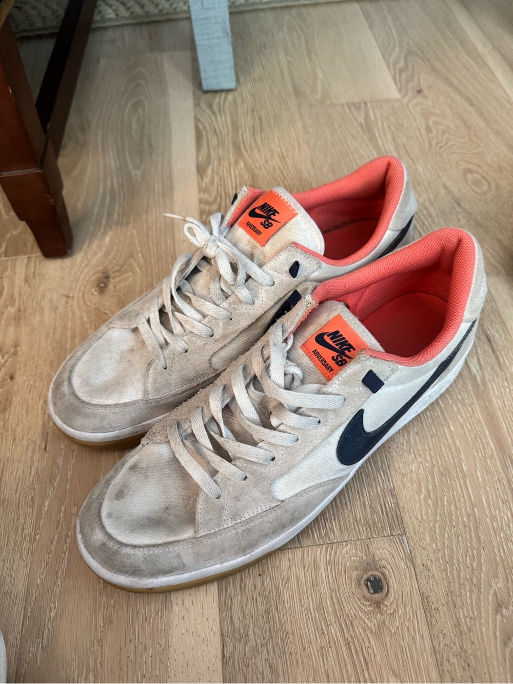 Nike SB Low-Top Sneakers in Beige with Navy Swoosh and Orange Lining- worn